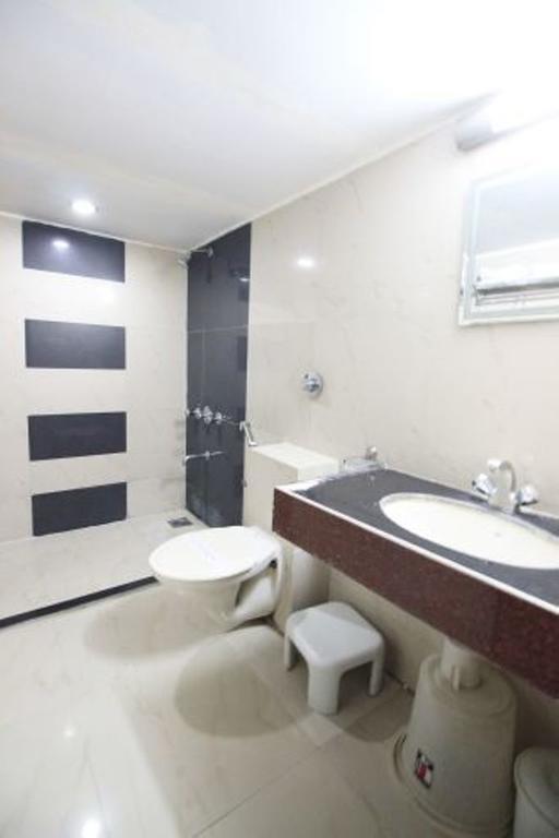 Hotel Eden Ahmadábád Szoba fotó